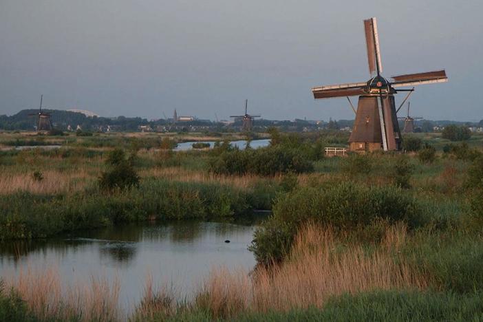 Explore an 18th century windmill with a modern day Dutch miller.