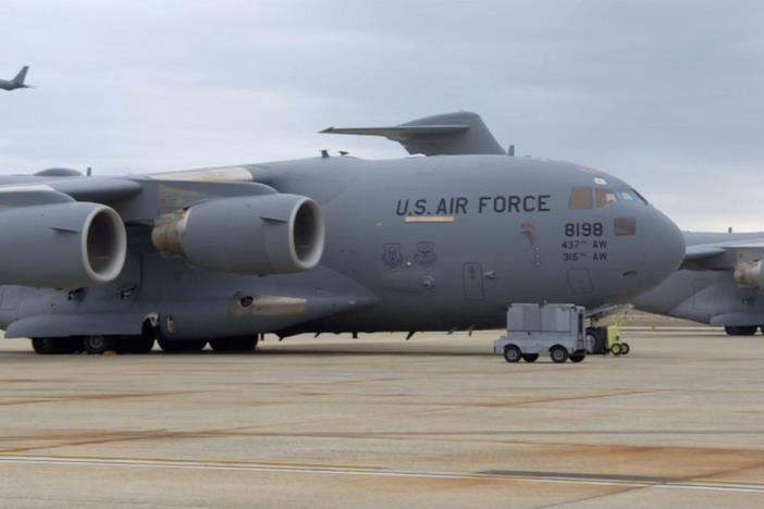 A glance back to the USO's beginnings and a look at this year's around-the-world tour.