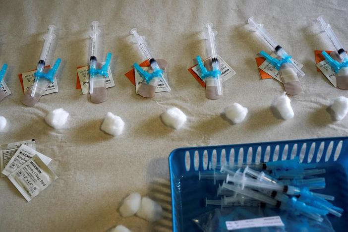 News Wrap: White House says vaccine shipments delayed by arctic storm
