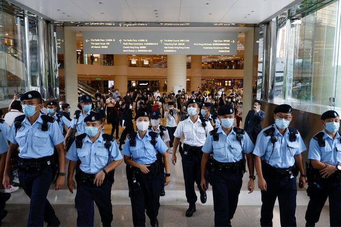 Hong Kong residents worry vague new immigration law could let China ban them from leaving