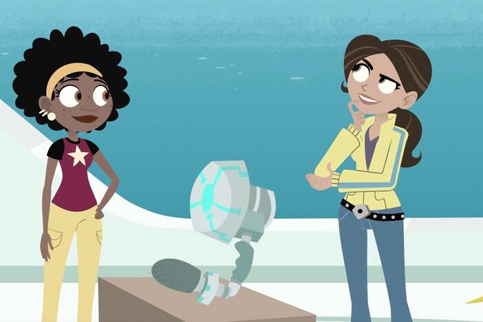 Aviva shows everyone her dolphin decoder invention.