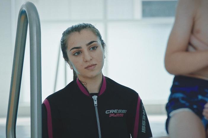 A young Yezidi girl wrestles quietly with her traumatic memories of the Mediterranean Sea.