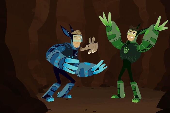 Martin and Chris activate into their aardvark power suits to save creatures from Zach.