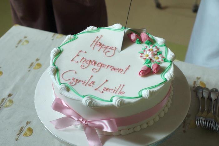 Lucille and Cyril celebrate their engagement with friends.