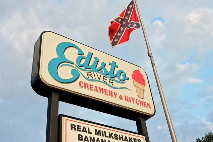 An ice cream shop owner learns that taking down a Confederate flag may not be so easy.