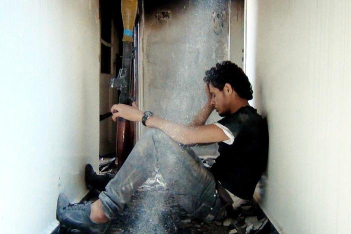A look behind the barricades of the besieged Syrian city of Homs.