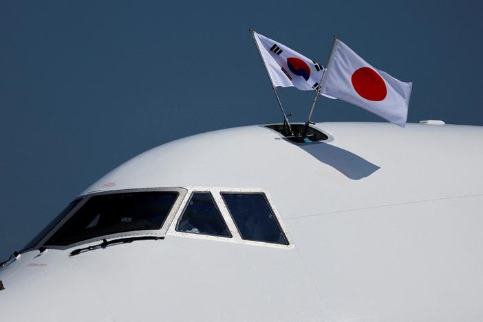 Biden reaches deal with Japan and South Korea to strengthen military coordination