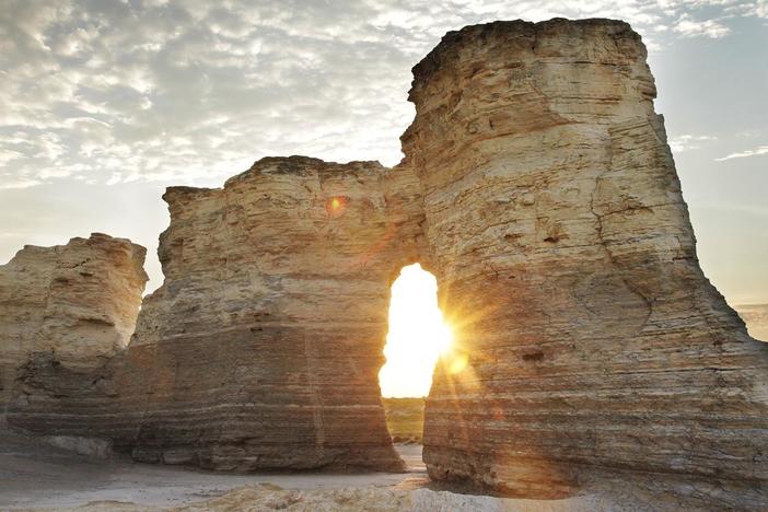 How did massive volcanic eruptions, inland seas, and land bridges pave the way for life?