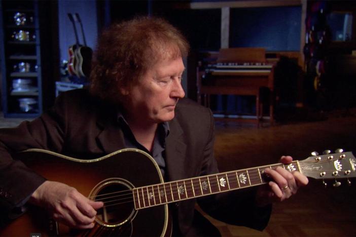 Randy Scruggs exhibits the playing styles of Maybelle Carter, Merle Travis and Doc Watson.