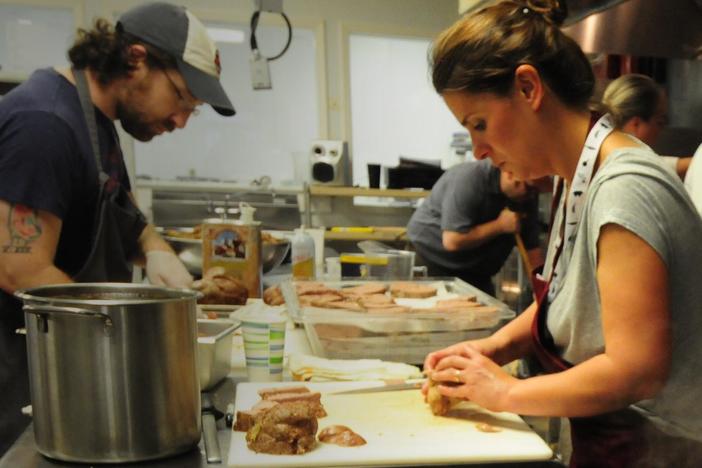 Vivian demonstrates how to make Tom Thumb, a sausage-stuffed pork dish.