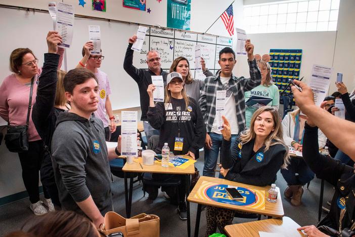 Early voting helps draw record turnout for Nevada caucuses
