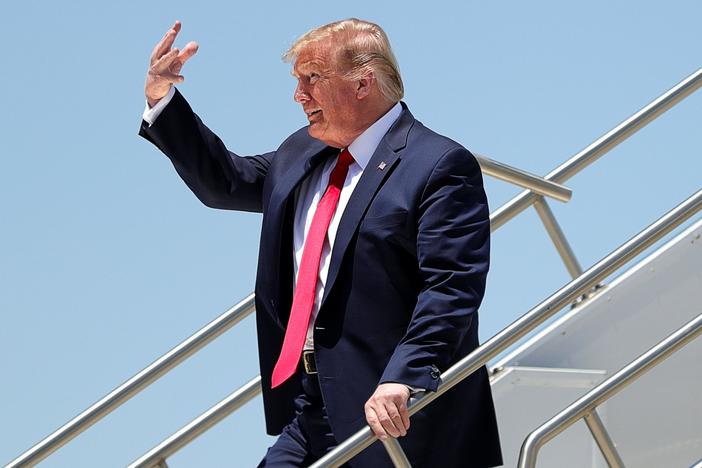 Traveling to Arizona, Trump wrestles with fallout of new death projections