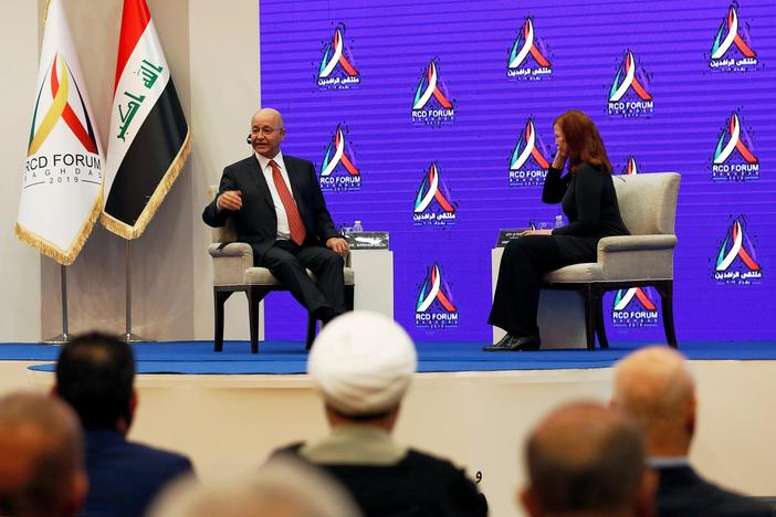 News Wrap: Iraqi president objects to Trump's comments on monitoring Iran
