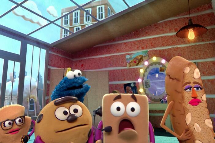 Cookie Monster stops the Crumb from ruining supermodel Giselle Biscotti's photo shoot.