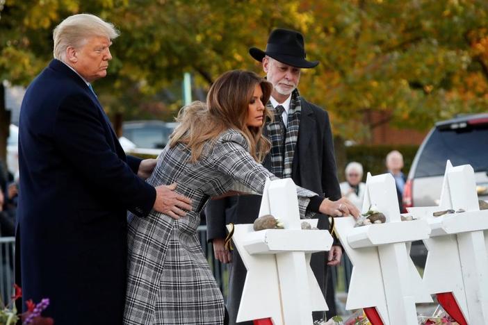 In Pittsburgh, the president and his protesters mourn shooting victims