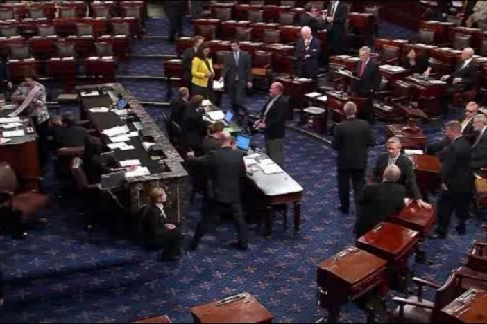 Lawmakers pass government funding bill. Plus the "Rubik's cube" of Trump personalities. 