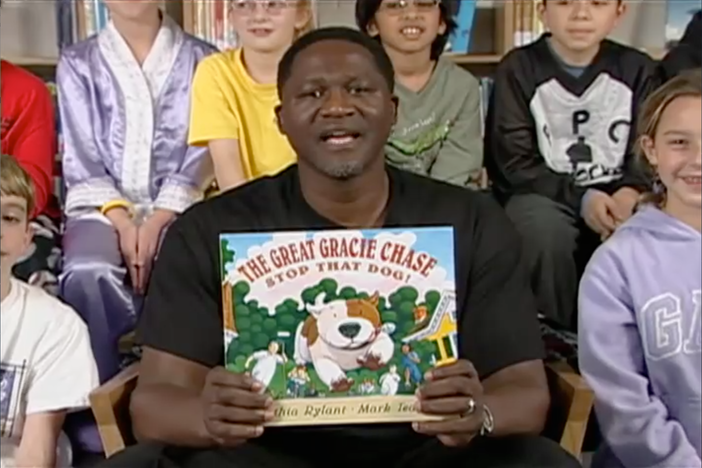 Dominique Wilkins, Atlanta Hawks, reads The Great Gracie Chase by Cynthia Rylant.