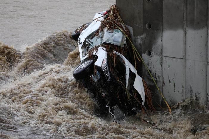 News Wrap: Huge storm system dumps snow, heavy rain on much of western U.S.