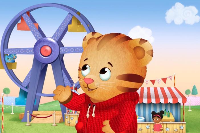 Daniel flies a kite, but it won't stay up. / Daniel is excited to ride a Ferris wheel.