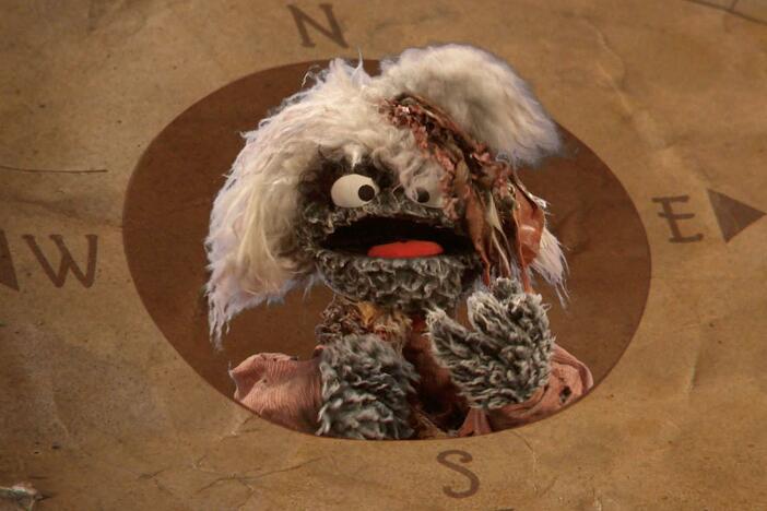 Oscar, Elmo, Abby, Nina, and Charlie find a 50 year old treasure map of Sesame Street.