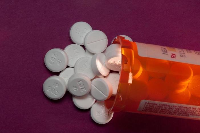 What does a $260 million settlement suggest for future opioid drug cases?
