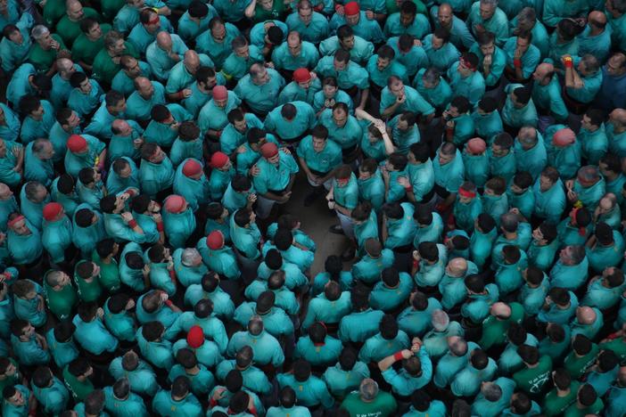 In Catalonia, Spain, teams compete to build the tallest, most complex human towers.