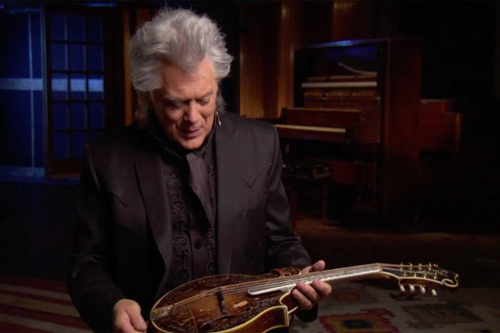 Marty Stuart describes the marks and inscriptions on his mandolin and how they got there.