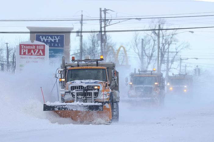 News Wrap: Winter weather cripples holiday travel