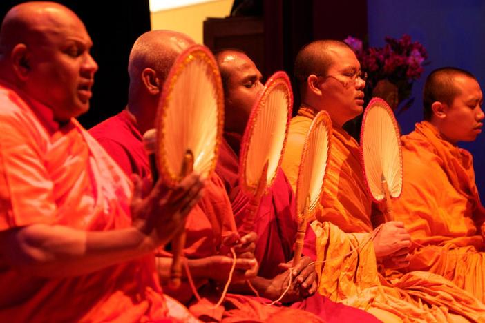 What is drawing people to the spiritual practices of Buddhism?