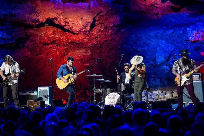 Shane Smith's music journey began in Austin, where he formed The Saints.