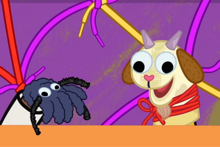 Lyla and Luke perform an Anansi and Goat folktale puppet play for Jamaica Day.