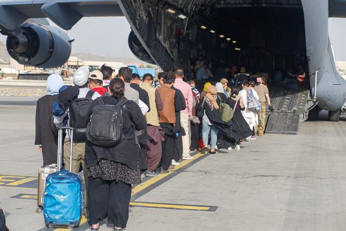 U.S. report on Afghanistan evacuation blames intelligence failures, Trump administration