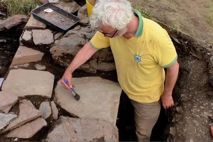 Archaeologists unearth a stone containing an inscription in Roman Latin and local dialect