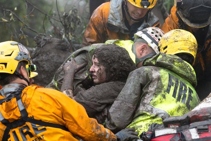 Mudslides swept through Southern California, ripping homes from foundations.