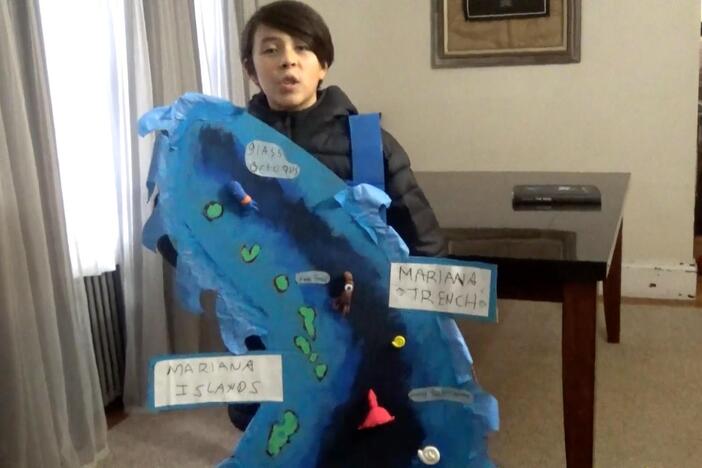 Odin dives into learning about the Mariana Trench!