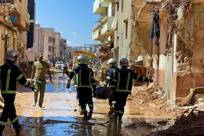 Aid workers struggle to reach city in Libya where catastrophic flooding killed thousands