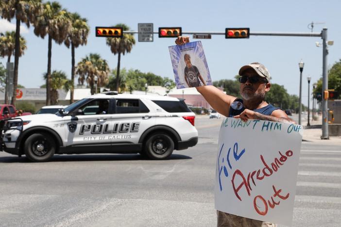 News Wrap: Embattled Uvalde schools police chief steps down from city council
