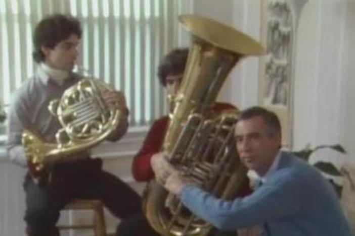 The Empire Brass Quintet; the Neighbors decorate for the festival.
