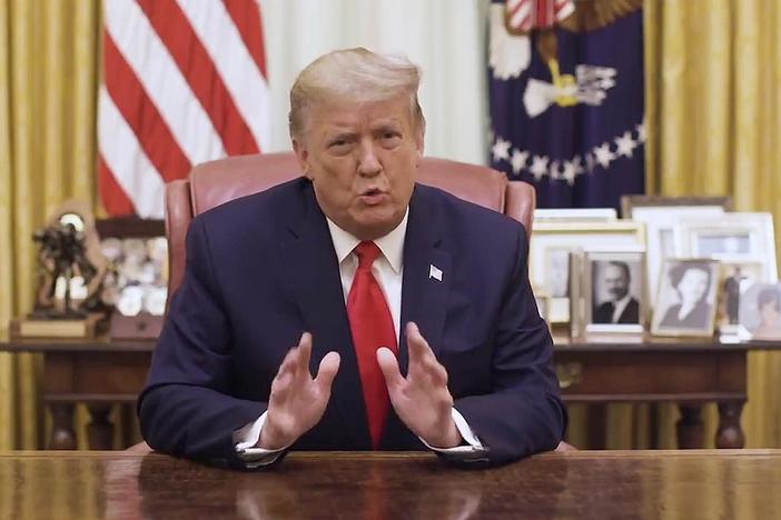 After impeachment vote, Trump condemns violence in video release