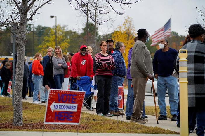 Candidates make final push in Georgia with critical Senate seat on the line
