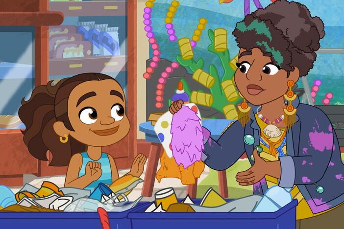 Alma struggles to use trash to make art, and is tempted to buy some new craft items.