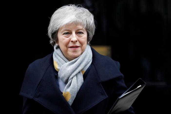 Parliament rejects Brexit deal, leaving May to scramble for a plan B