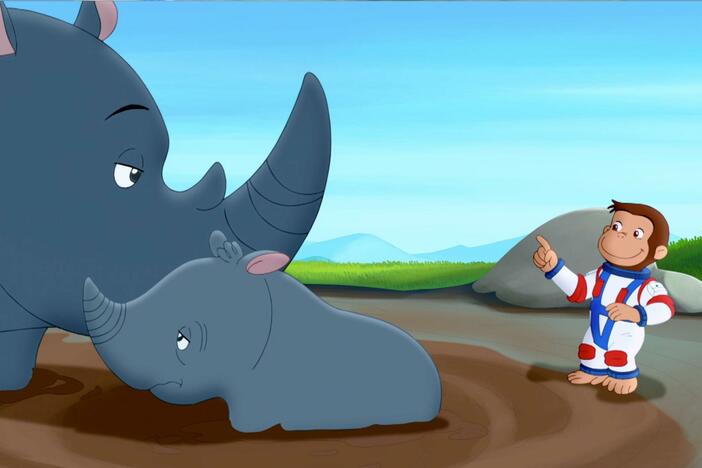George thinks of a unique way to help the baby rhino get out of the mud. 
