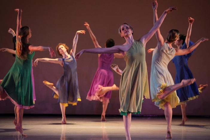 Twelve women dance to an air for soprano in a section of Mark Morris's signature work.