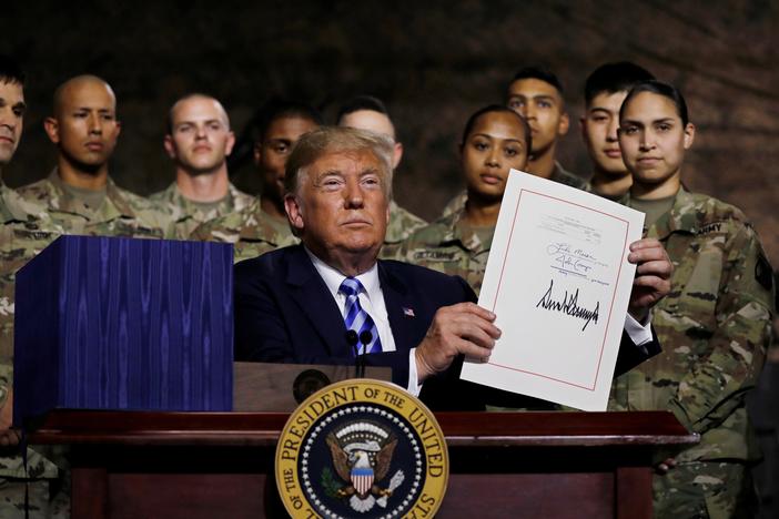 Massive defense policy bill takes steps to restrain Trump
