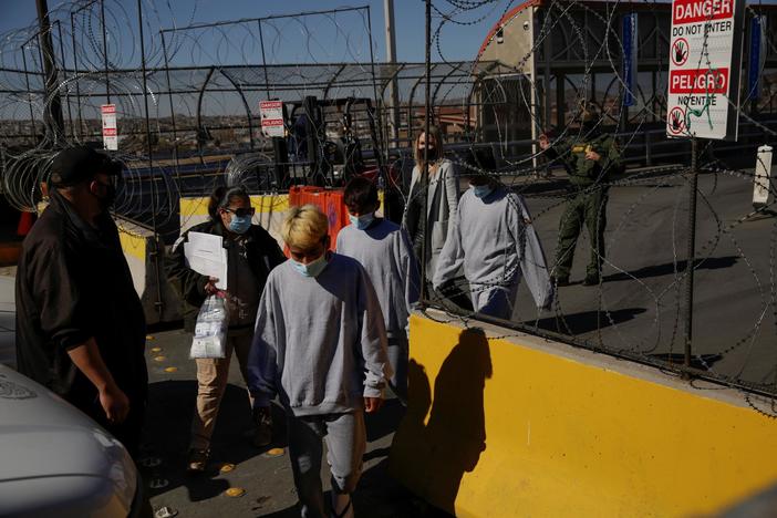 News Wrap: Federal judge temporarily blocks Biden's ban on deportations