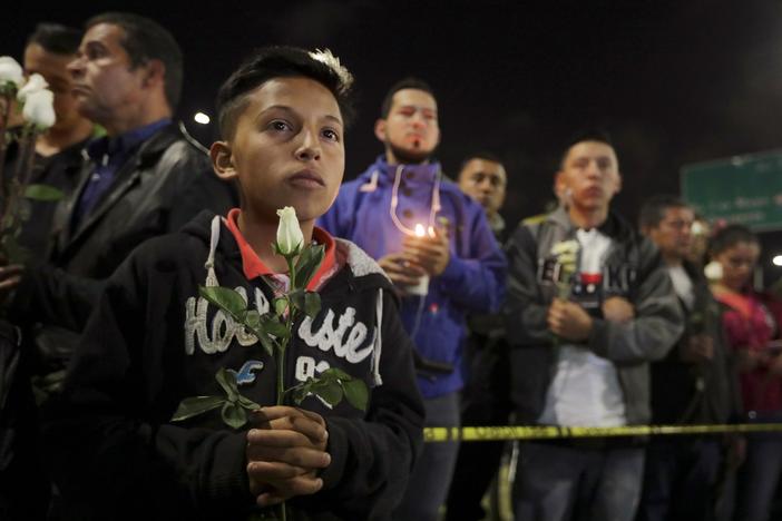 News Wrap: Death toll in Colombia car bombing rises to 21