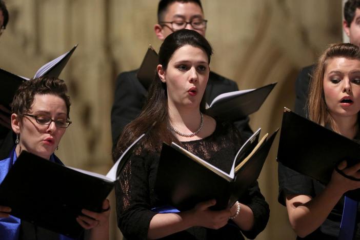 A choir performs John Tavener's "Song of Athene" at the Washington National Cathedral.