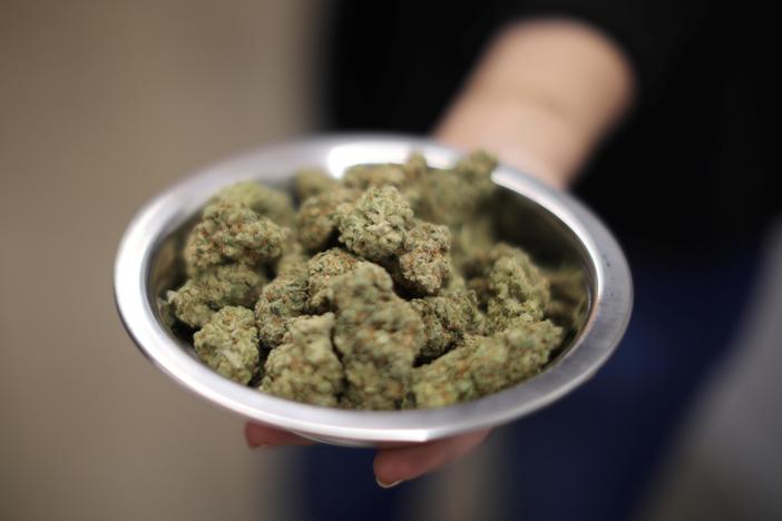 New federal guidance raises questions for legal marijuana