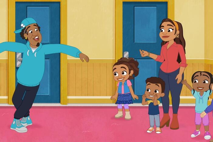 Mami and Frankie demonstrate their best breaking moves at Kids' Club.
